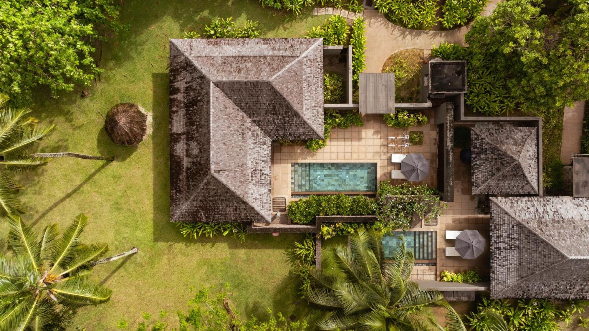 Constance Ephelia Hotel Port Glaud Exterior photo Aerial view of a villa